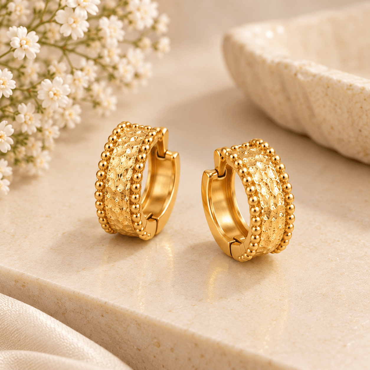 Embossed textured gold huggie hoop earrings