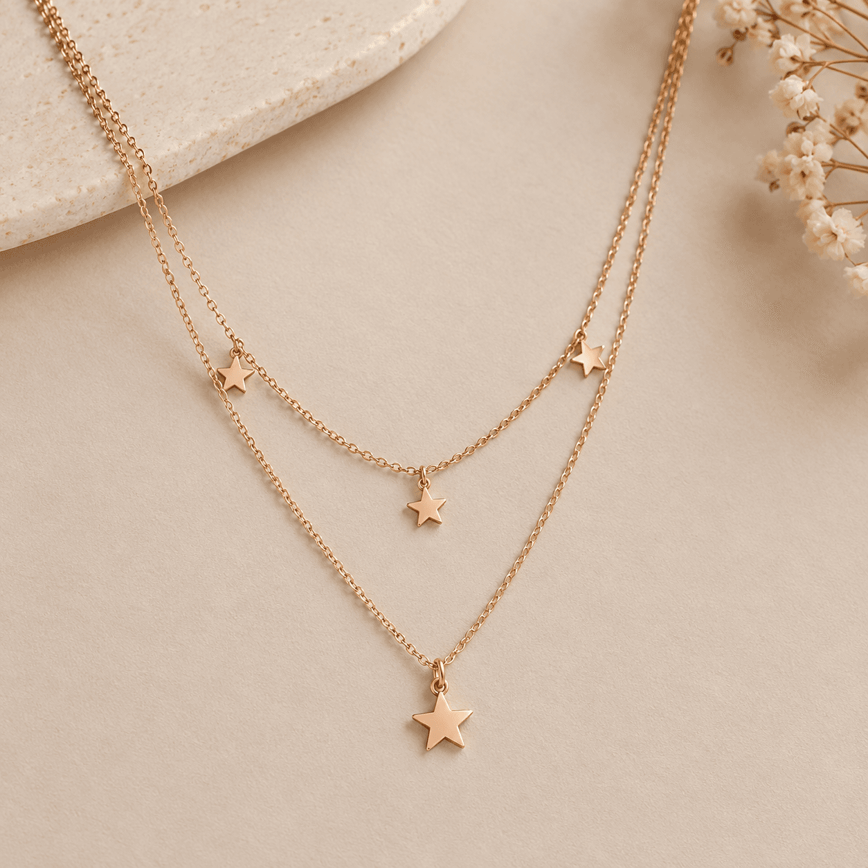 Delicate layered necklace with star pendants